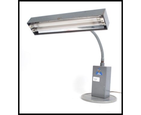 A 1970's Industrial desk top anglepoise lamp in metal with original enamel grey finish having rectangular light and shade by 