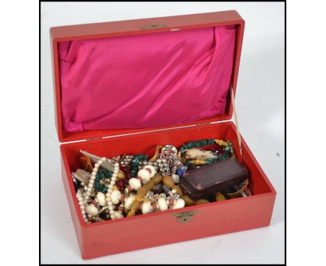 A collection of vintage jewellery including necklaces, bracelets and Scottish brooches.