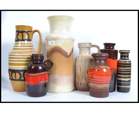 A collection of seven retro 20th century West German Ceramic fat lava stick stand &nbsp;and vases. Largest measures 40cm tall