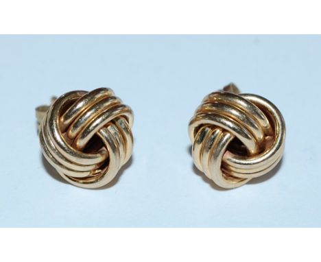 A pair of 9ct gold knot earrings with post backs. Total weight approx &nbsp;2g. Measures approx 1cm. Test 9ct gold.