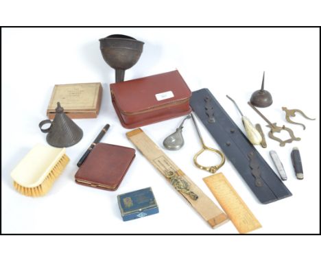A collection of vintage items to include an Ideal 9ct lever fill fountain pen, &nbsp;oil tins, gents vanity set, draughtsman 