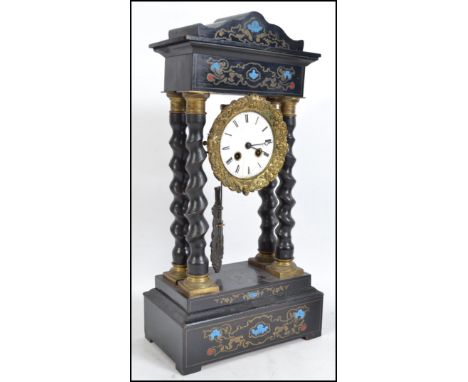 A &nbsp;late 19th century French Portico mantle clock, the gilt dial with Roman numerals, flanked by Corinthian style columns