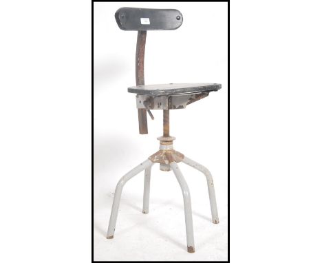 A vintage mid century industrial machinist / draughtmans swivel chair, having a painted wooden seat pad and back rest, being 