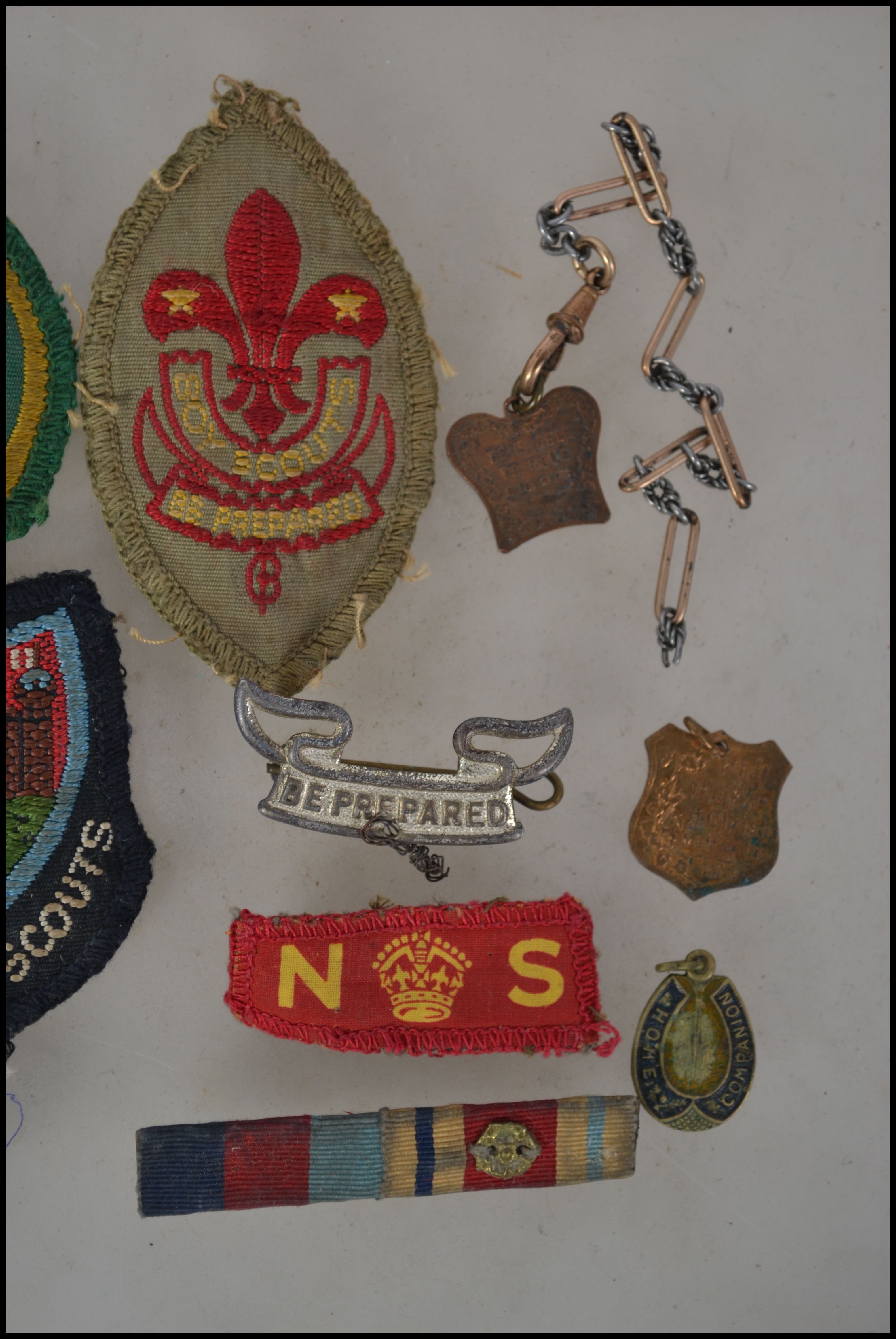 A collection of vintage Boy Scouts badges and patches to include ...