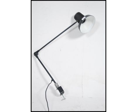 A 20th century retro industrial machinist's angle-poise style work lamp having a conical shade, ball joints, and clamp for fi