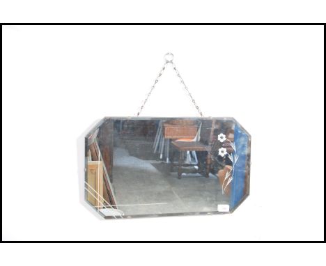 A vintage mid 20th century frame-less wall mirror having an etched decoration to the mirror.&nbsp;Measures height 33cm x widt