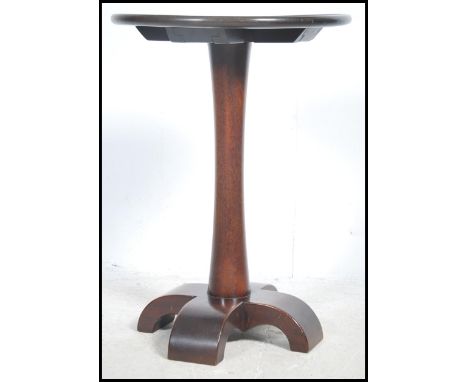 A bespoke handmade solid oak tripod lamp table in the Georgian style.The table raised on quadruped base with turned column an