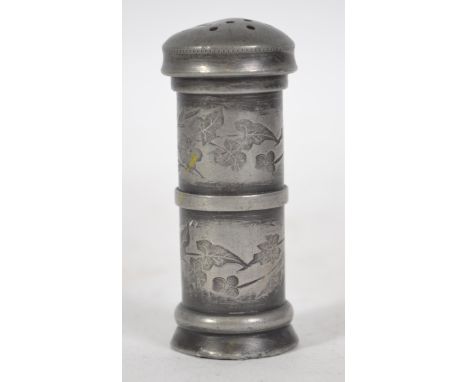 A believed 18th century pewter writing sander of column form having a full engraved design. Measures 7cms high