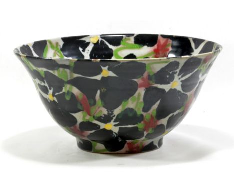 JANICE TCHALENKO (born 1942) for Dartington Pottery; a large deep stoneware bowl decorated with black rose pattern, collector