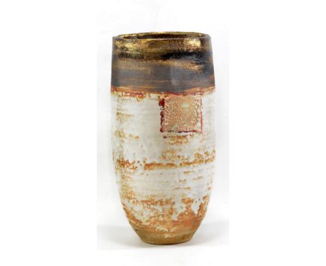 ROBIN WELCH (born 1936); a tall stoneware vessel, white glaze with gold rim and flesh coloured squares bordered by red enamel