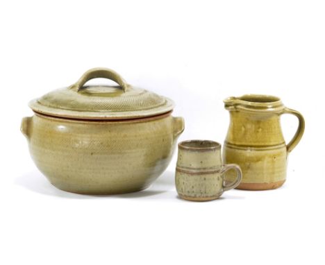 RICHARD BATTERHAM (born 1936); a stoneware jug and cup, jug height 13.5cm, and an Andrew Marshall casserole, diameter 24.5cm 
