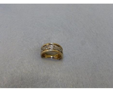 A 9ct gold diamond banded ring, size J/K. 