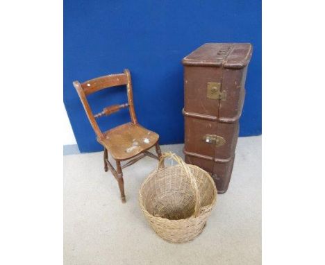 A canvas and wooden bound trunk, a wicker basket and an elm seated chair. 