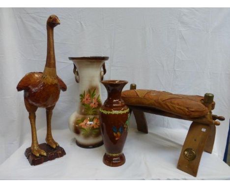 A wicker and bamboo figure of an ostrich, a camel stool, a turned wooden vase and a large ceramic vase. 