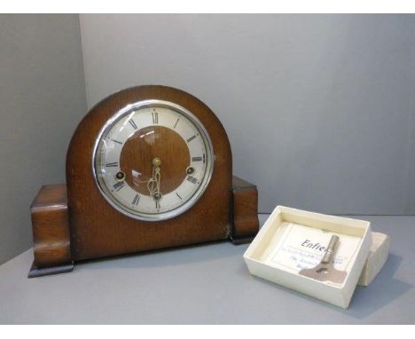 An Art Deco oak cased Smiths Enfield mantle clock. 