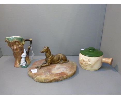 A Hornsea 'haunted tree' jug, a Sylvac beef dripping lidded pot and an onyx lamp base surmounted by a recumbent spelter greyh