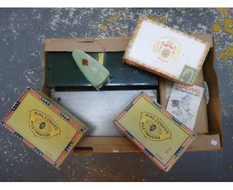 A boxed and unused Spong 7oz kitchen set, two metal index card holders, a German plastic cased metronome and three cigar boxe