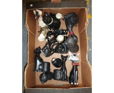 A collection of 1950s and later ceramic cat figurines. 