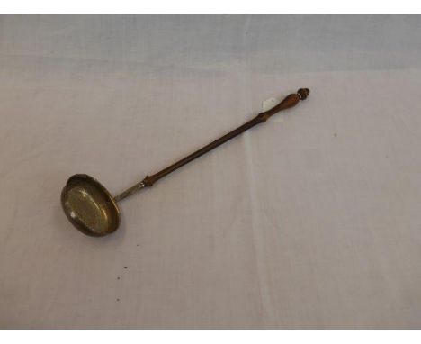 A 19th Century punch ladle. 