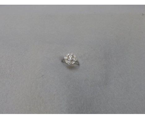 An 18ct white gold Art Deco style ring set with approximately 1.2 carats of diamonds, size O/P.