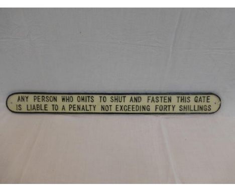 A cast metal 3ft railway sign 'Fasten the gate, forty shillings penalty'. 