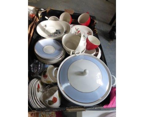 An Alfred Meakin Midwinter style six setting tea set and a Royal Doulton four setting dinner service. 