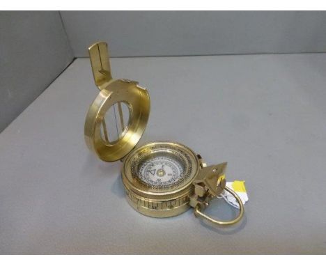 A contemporary brass military compass stamped F.Barker & Son Ltd. London 1939.