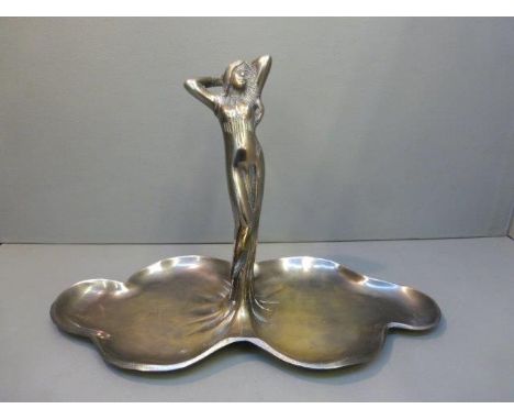 A cast metal dish with carrying handle in the form of an Art Nouveau lady. 