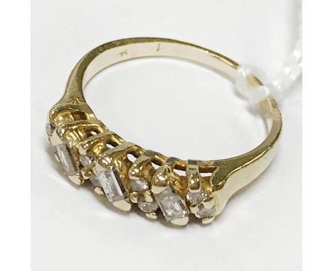 18CT GOLD BAGUETTE CUT DIAMOND RING - 6.1 GRAMS APPROX