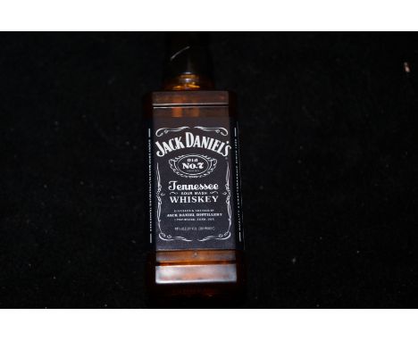 Jack Daniels novelty cigarette lighter, in the form of a whiskey bottle 