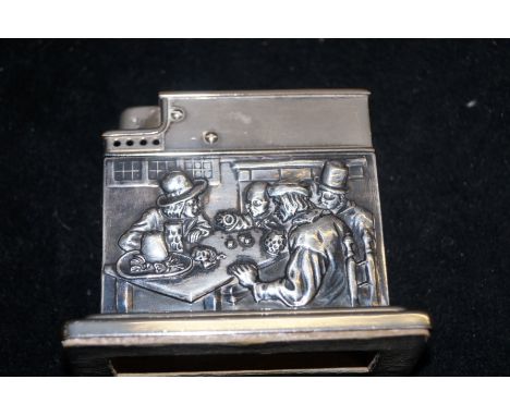 Continental silver mounted table cigarette lighter depicting gentleman and tavern scene  