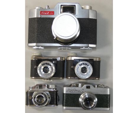 A collection of sub-miniature cameras, to include a Meopta Mikrona II in green covering, two Kunik Petie cameras, Japanese "H