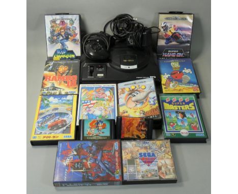 A Sega Mega Drive 16-Bit games console, together with ten boxed and three loose games including Rolo To The Rescue, Super Han