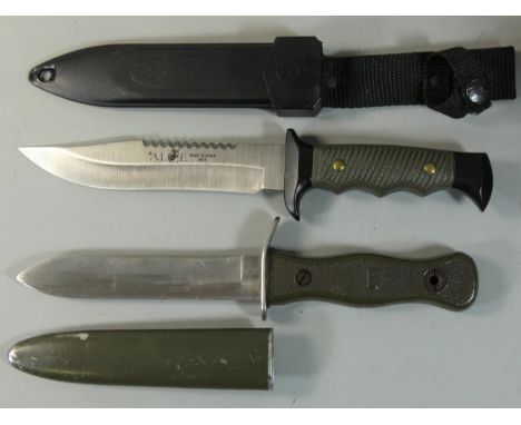 A Muela 5161 fixed blade knife, green ABS composition handle, blade 16 cm, scabbard and a German Army OFW70 knife with scabba