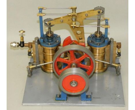 A scratchbuilt twin cylinder dead centreless air driven beam engine, base measures 17.5 x 22.5cm. 