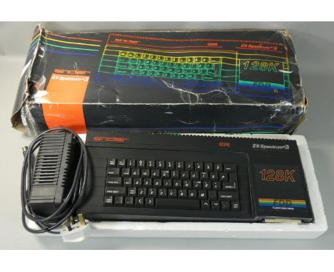 A boxed ZX Spectrum +3 video game console. 