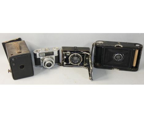 A collection of vintage cameras and accessories, to include a cased Zeiss Ikon, cased Kodak camera, Braun Poxette, cased Reid