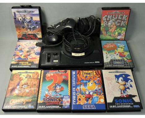 A Sega Mega Drive 16-Bit games console, together with ten boxed and three loose games including Sonic The Hedgehog, Chuck Roc