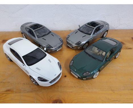 Die cast, scale 1:18, Aston Martin Vanquish x 2, Aston Martin DB7, Aston Martin Rapide, cases (4) 