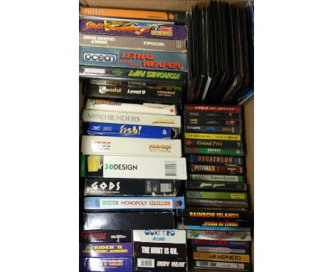 Approximately sixty Atari ST and Commodore 64 tapes and cassettes, to include Cluedo/Monopoly/Scrabble 3-in-1, Pitfall II, Le