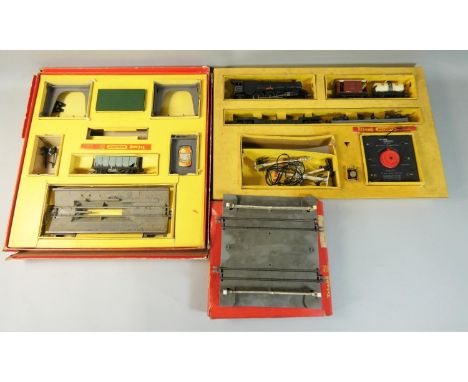 Three boxed Hornby 'OO' gauge railway accessories, to include R.135 Operating Ore Wagon Set, R.170 B.R. Level Crossing (elect