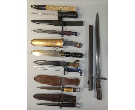 A British Remington military issued bayonet, dated 1913, with broad arrow marks to blade base and six other bayonets and kniv