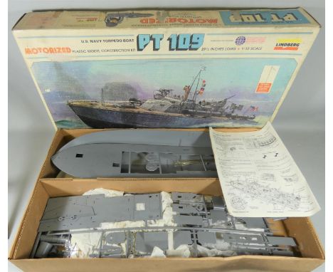 A boxed Lindberg 'PT 109' motorized plastic model construction kit, of a U.S. Navy torpedo boat, with detailed crew and movab