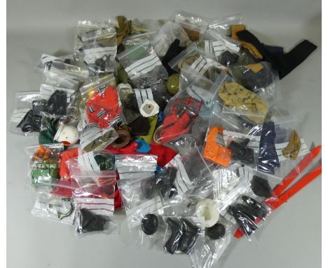 A large collection of Action Man accessories and clothing, to include a Special Operations Kit, Scottish kilt, various rifles