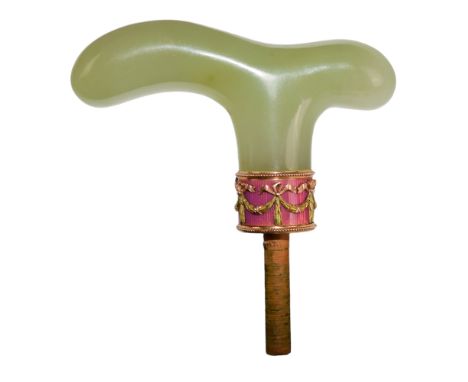 Faberge Imperial Russia Circa 1900 A two coloured gold and pink guilloche enamel bowenite cane handle With '56' Zolotniks mar