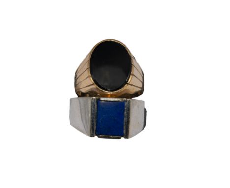 American Circa 1960 A white gold and lapis lazuli signet ring (ring size R) And an onyx and yellow metal dress ring (ring siz
