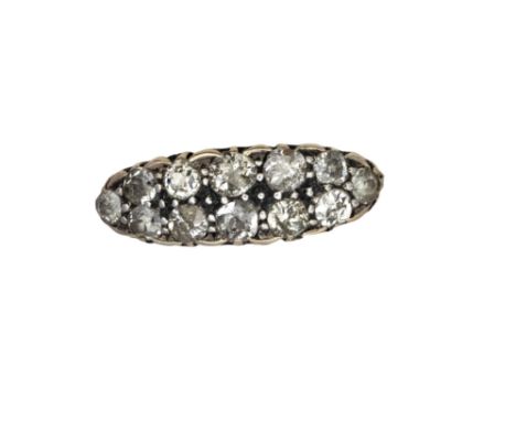 British Antique A carved yellow gold and diamond cluster dress ring  Weight: Approx. 3.89 grams Ring size: P 