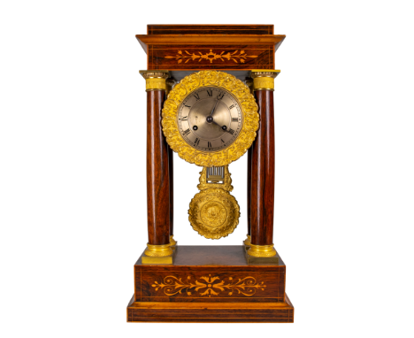 French Charles X An ormolu mounted rosewood inlay mantel clock From the Dr Mohammed S Farsi Collection Dimensions: 17 in. (H)