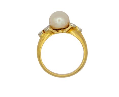 Continental Circa 1970 A diamond and pearl dress ring  Weight: Approx. 7.99 grams Ring size: P 