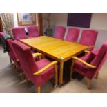 9 x Pink corded upholstered high backed chairs with easy push wheels, 3 x mobile wooden tables